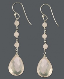 Shine from every angle. These faceted drops feature shimmery rose quartz (17-1/10 ct. t.w.) in a delicate sterling silver setting. Approximate drop: 2-1/4 inches. Shine from every angle. These faceted drops feature shimmery rose quartz (17-1/10 ct. t.w.) in a delicate sterling silver setting. Approximate drop: 2-1/4 inches.