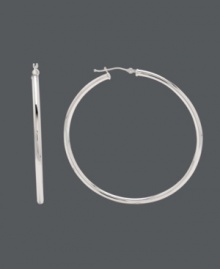 Style that's simple, but still makes a cool statement. Earrings feature a traditional hoop design and click backing set in polished, 14k white gold. Approximate diameter: 2 inches. Style that's simple, but still makes a cool statement. Earrings feature a traditional hoop design and click backing set in polished, 14k white gold. Approximate diameter: 2 inches.