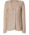 Take on this seasons love for chunky knits with Paul & Joe Sisters cozy Shetland cardigan, detailed with contrast patterning for an understated modern feel - V-neckline, button-down contrast knit front, long sleeves - Easy straight silhouette - Layer over tissue tees and leather leggings, or try with button-downs, favorite skinnies and flats