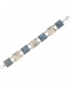 From workday to weekend, this denim is the perfect fit. GUESS takes everyone's favorite pair of blue jeans and incorporates it into a casual-chic bracelet. Pyramid-shaped denim and crystal accents shine in a silver tone mixed metal setting. Approximate length: 7-1/2 inches.