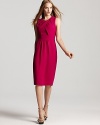 Vibrant magenta feels ever-so-perfect for the season, taking form in a standout sheath dress from Burberry.