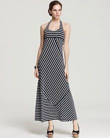 Stacked stripes zigzag the length of this DKNY maxi dress for a graphic take on the nautical trend. Team with retro sunglasses and sky-high wedges for a standout ensemble. Stacked stripes zigzag the length of this DKNY maxi dress for a graphic take on the nautical trend. Team with retro sunglasses and sky-high wedges for a standout ensemble.