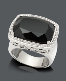 Get ready for an evening out on the town with this bold statement ring. Crafted in sterling silver with an intricate side design, a large cushion-cut onyx (13 x 8 mm) serves as the focal point. Size 7. Get ready for an evening out on the town with this bold statement ring. Crafted in sterling silver with an intricate side design, a large cushion-cut onyx (13 x 8 mm) serves as the focal point. Size 7.