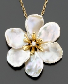 Free your style with this beautiful pendant featuring cultured freshwater keishi pearl (12/14 mm) and diamond accents set in 14k gold. Approximate length: 18 inches. Approximate drop: 1-1/4 inches. Free your style with this beautiful pendant featuring cultured freshwater keishi pearl (12/14 mm) and diamond accents set in 14k gold. Approximate length: 18 inches. Approximate drop: 1-1/4 inches.