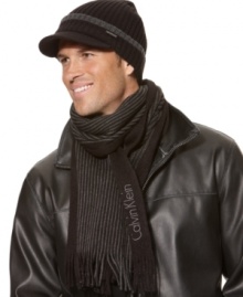 Put the finishing touches on any casual combination and top off your favorite looks with this ribbed radar cap from Calvin Klein. Put the finishing touches on any casual combination and top off your favorite looks with this ribbed radar cap from Calvin Klein.