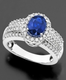 Experience regal beauty. This opulent ring features oval-cut sapphire (1 ct. t.w.) surrounded by round-cut diamonds (3/4 ct. t.w.) set in 14k white gold. Experience regal beauty. This opulent ring features oval-cut sapphire (1 ct. t.w.) surrounded by round-cut diamonds (3/4 ct. t.w.) set in 14k white gold.