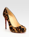 Leopard-print pony hair adds exoticism to this platform pump with leather trim and a signature red leather sole. Self-covered heel, 4½ (115mm)Covered platform, ½ (15mm)Compares to a 4 heel (100mm)Leopard-print pony hair upperLeather liningSignature red leather solePadded insoleMade in ItalyOUR FIT MODEL RECOMMENDS ordering one half size up as this style runs small. 