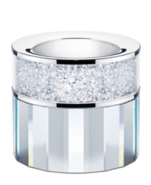 With 1,600 chatons, a multi-faceted base and gleaming silvertone metal, this precious Swarovski Crystalline candle holder transforms a single flame into a truly spectacular light show. With 1,600 chatons, a multi-faceted base and gleaming silvertone metal, this precious Swarovski Crystalline candle holder transforms a single flame into a truly spectacular light show.