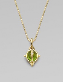 A smooth, peridot cabochon locket with three dazzling diamonds, all set in 18k gold. PeridotDiamonds, .025 tcw18k goldSize, about ¼Fixed baleMade in ItalyPlease note: Chain not included. A smooth, peridot cabochon locket with three dazzling diamonds, all set in 18k gold. PeridotDiamonds, .025 tcw18k goldSize, about ¼Fixed baleMade in ItalyPlease note: Chain not included.