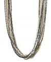 Luxurious layers that blend effortlessly with any look. Alfani's trendy tri-tone necklace combines swirling chains crafted from silver, gold and hematite tone mixed metal. Approximate length: 36 inches + 2-1/2-inch extender.