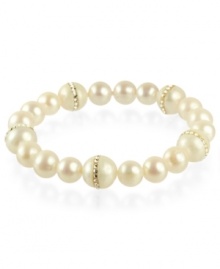 Elegance defined. This pretty stretch bracelet combines cultured freshwater pearls (8-10 mm) and cubic zirconia accents in a polished 18k gold over sterling silver setting. Approximate length: 7-1/2 inches. Elegance defined. This pretty stretch bracelet combines cultured freshwater pearls (8-10 mm) and cubic zirconia accents in a polished 18k gold over sterling silver setting. Approximate length: 7-1/2 inches.