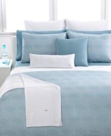 Calm, cool & collected! Add a touch of modern style to your bed with this Trocadero duvet cover from Lacoste. A landscape of geometric patterns are the focal point, while piped edges and the signature Lacoste crocodile patch add extra flair. Button closure.