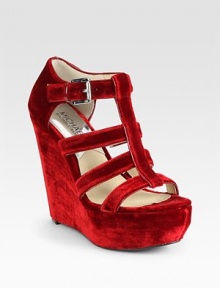 Elaborate velvet wedge with an adjustable ankle strap and chunky platform. Self-covered wedge, 5 (125mm)Covered platform, 1½(40mm)Compares to a 3½ heel (90mm)Velvet upperLeather liningRubber solePadded insoleImported