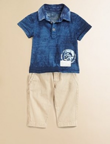 A signature polo design is transformed into a rugged knit, adorned with front and back graphics.Polo collarShort sleevesButton frontFront and back graphicsCottonMachine washImported A signature polo design is transformed into a rugged knit, adorned with front and back graphics.Polo collarShort sleevesButton frontFront and back graphicsCottonMachine washImported