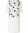 Fine wool-silk blend dress with feminine floral embroidery - Elegant with with slightly-tapered, classic cut featuring a round neckline and 3/4-length sleeves - Comfortable thigh-length - Full accent zipper at back - Sophisticated choice for upscale dinner events when paired with platform pumps and a clutch