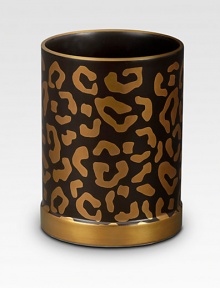 Stay organized with this leopard-print porcelain container featuring shiny goldtone accents. 3½ highMade in Portugal Stay organized with this leopard-print porcelain container featuring shiny goldtone accents. 3½ highMade in Portugal