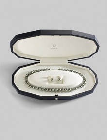 From the South Sea Collection. A gorgeous strand of graduated black cultured pearls set in 18k white gold and pearl stud earrings to match, for a gift set that makes a lasting impression. Presented in elegant oyster-shaped box. Necklace:8mm-10mm black round cultured pearls Quality: A+ 18k white gold Length, about 18 Mikimoto signature clasp ImportedEarrings:9mm black round cultured pearls Quality: A+ 18k white gold Post back Imported From the South Sea Collection. A gorgeous strand of graduated black cultured pearls set in 18k white gold and pearl stud earrings to match, for a gift set that makes a lasting impression. Presented in elegant oyster-shaped box. Necklace:8mm-10mm black round cultured pearls Quality: A+ 18k white gold Length, about 18 Mikimoto signature clasp ImportedEarrings:9mm black round cultured pearls Quality: A+ 18k white gold Post back Imported