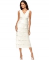 R&M Richards sophisticated dress is made evening-worthy with a sequined empire waist and pretty tiered skirt.