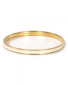 Haute gets humorous. Transform every outfit in typical kate spade new york style with this playfully engraved gold and resin bangle.