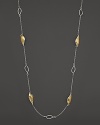 Organically textured sterling silver beads form a long, dramatic necklace from the John Hardy Palu Kapal collection.