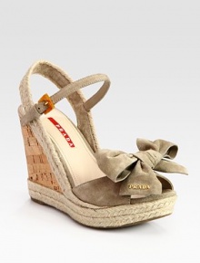 Suede upper with an espadrille slingback, cork wedge and bow detail. Cork and hemp wedge, 4 (100mm)Hemp platform, 1 (25mm)Compares to a 3 heel (75mm)Suede upperLeather liningRubber solePadded insoleImportedOUR FIT MODEL RECOMMENDS ordering true size. 