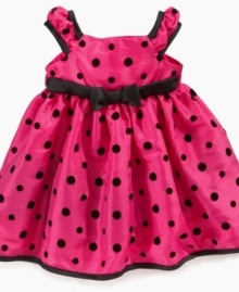Polka dots sweeten up her party-time look with this precious dress from Penelope Mack. Polka dots sweeten up her party-time look with this precious dress from Penelope Mack.