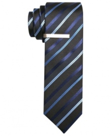 Create a little cool contrast in the concrete jungle with this striped skinny tie from Alfani RED. Create a little cool contrast in the concrete jungle with this striped skinny tie from Alfani RED.