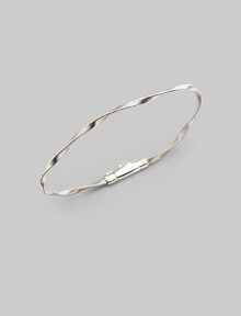 Simply stunning, this 18k gold bangle with delicate ridges and twists is great on its own, even better when stacked in multiples. 18k gold Diameter, about 2½ Tongue-and-groove clasp Imported Please note: Bracelets sold separately. Simply stunning, this 18k gold bangle with delicate ridges and twists is great on its own, even better when stacked in multiples. 18k gold Diameter, about 2½ Tongue-and-groove clasp Imported Please note: Bracelets sold separately.
