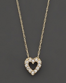 A beautiful diamond heart pendant in 14 Kt. yellow gold, with rope chain.
