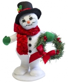 Winter gets a warm welcome with this cozy Christmas snowman. Standing on his own two feet, he greets the season in a velvety red scarf and black top hat. With the soft features and unmistakable style of Annalee dolls. Winter gets a warm welcome with this cozy Christmas snowman. Standing on his own two feet, he greets the season in a velvety red scarf and black top hat. With the soft features and unmistakable style of Annalee dolls.