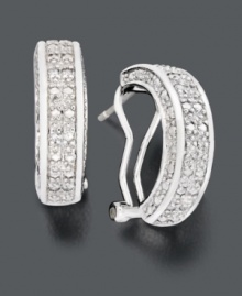 Add timeless beauty with a hint of sparkle. Dazzling hoop earrings by Victoria Townsend feature round-cut diamond (1/2 ct. t.w.) along the front and sides. Crafted in sterling silver. Approximate diameter: 3/4 inch. Add timeless beauty with a hint of sparkle. Dazzling hoop earrings by Victoria Townsend feature round-cut diamond (1/2 ct. t.w.) along the front and sides. Crafted in sterling silver. Approximate diameter: 3/4 inch.