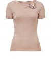 Raise the bar on ladylike luxe with Valentinos undeniably elegant pale pink wool top -  Feminine, fitted silhouette tapers gently through waist  - Short sleeves and flattering draped neckline with rosette embellishment - Seamlessly transitions from the office to dinner, drinks and events - Pair with pencil skirts, cigarette pants or ankle-cropped trousers and style with ballet flats or classic pumps