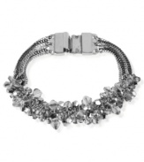 Banded together for eclectic elegance, Kenneth Cole New York offers this multi-chain bracelet. It's crafted from silver-tone mixed metal and features faceted bead accents. Approximate length: 7-1/2 inches.