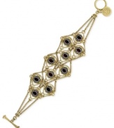 Postmodern flair. Jessica Simpson's draped chain bracelet, crafted from gold-tone mixed metal with faceted red stone accents, epitomizes contemporary chic. Approximate length: 8 inches.