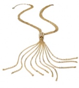 Whip your style into shape. Swishing chains in a lariat design pair with a crystal-accented station clasp to create a sleek look on this Alfani necklace. Set in 12k gold-plated mixed metal. Approximate length: 25 inches + 3-inch extender. Approximate drop: 7-1/2 inches.