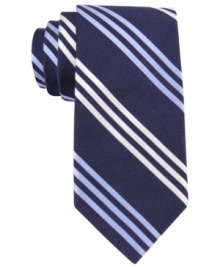 Fine lines. This skinny tie from Tommy Hilfiger takes a prep staple and slims it down. Fine lines. This skinny tie from Tommy Hilfiger takes a prep staple and slims it down.