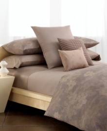 This woven matelasse coverlet from Calvin Klein makes a luxe addition to your bed in soft and sophisticated combed cotton. (Clearance) This woven matelasse coverlet from Calvin Klein makes a luxe addition to your bed in soft and sophisticated combed cotton. (Clearance)