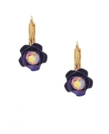 Vibrantly violet. A pretty purple hue stands out on these delicate flower-motif drop earrings from Betsey Johnson. Featuring a colorful, sparkling crystal accent in the center, they're crafted in antique gold tone mixed metal. Approximate drop: 9/10 inch.