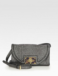 A tactile design in textured leather with a logo accented turnlock closure and tortoise-print accents.Detachable adjustable shoulder strap, 21½-23½ dropTurnlock flap closureOne inside zip pocketCotton lining9W X 5H X 2DImported A tactile design in textured leather with a logo accented turnlock closure and tortoise-print accents.Detachable adjustable shoulder strap, 21½-23½ dropTurnlock flap closureOne inside zip pocketCotton lining9W X 5H X 2DImported