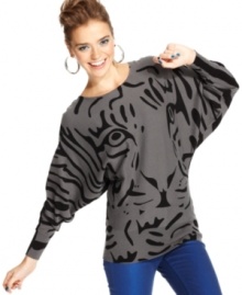 Material Girl contrasts a tiger-print at the front with a back of bold stripes on this dolman sleeve sweater that reflects your love of graphic style!