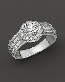 Round brilliant diamond ring with diamond band.