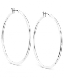 Simply chic. Anne Klein's hoop earrings are crafted from silver-tone mixed metal and add a touch of elegance for any affair. Approximate diameter: 1-1/2 inches.