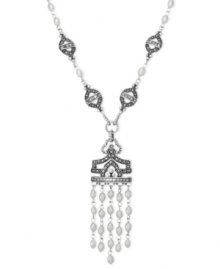 A tassel that's well worth it. Genevieve & Grace's sterling silver pendant features cultured freshwater pearls (4-4-1/2 mm) in a prominent fashion, as well as marcasite to enhance the appeal. Approximate length: 18 inches. Approximate drop: 1-3/4 inches. Approximate drop width: 1-1/8 inches. A tassel that's well worth it. Genevieve & Grace's sterling silver pendant features cultured freshwater pearls (4-4-1/2 mm) in a prominent fashion, as well as marcasite to enhance the appeal. Approximate length: 18 inches. Approximate drop: 1-3/4 inches. Approximate drop width: 1-1/8 inches.