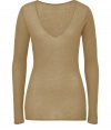 Ground on trend statement pieces with Closeds classically chic beige pullover - Lightweight and supremely soft in a cotton and cashmere blend - Slim, ultra-feminine cut tapers through waist and hits below hips - Long, fitted sleeves and a flattering deep v-neck - Pair with a patterned pencil skirt, leather pants or printed trousers