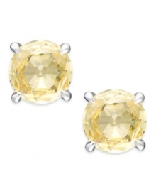Simply elegant. Arabella's stud earrings sparkle with round-cut yellow Swarovski zirconias for a vibrant touch. Set in sterling silver. Approximate diameter: 1/3 inch. Simply elegant. Arabella's stud earrings sparkle with round-cut yellow Swarovski zirconias for a vibrant touch. Set in sterling silver. Approximate diameter: 1/3 inch.