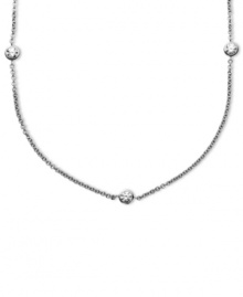 Delicate design with a touch of sparkle. Arabella's pretty necklace is set in sterling silver with eleven round-cut Swarovski zirconia stations (4-9/10 ct. t.w.). Approximate length: 36 inches. Delicate design with a touch of sparkle. Arabella's pretty necklace is set in sterling silver with eleven round-cut Swarovski zirconia stations (4-9/10 ct. t.w.). Approximate length: 36 inches.