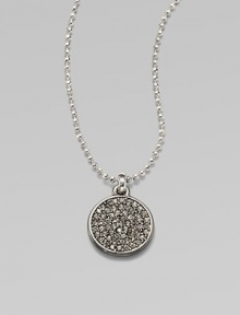 Glittering pavé: stones set in a chic disc pendant on a ball chain. Cubic zirconia and glass stonesSilvertone metalLength, about 16Pendant size, about .5Toggle closure with logo charmImported Glittering pavé: stones set in a chic disc pendant on a ball chain. Cubic zirconia and glass stonesSilvertone metalLength, about 16Pendant size, about .5Toggle closure with logo charmImported
