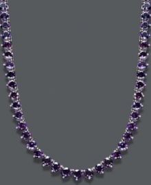 Add color to your neckline with the most regal hue. Round-cut amethysts (30 ct. t.w.) shimmer in this stunning collar necklace. Crafted in sterling silver. Approximate length: 17 inches. Add color to your neckline with the most regal hue. Round-cut amethysts (30 ct. t.w.) shimmer in this stunning collar necklace. Crafted in sterling silver. Approximate length: 17 inches.