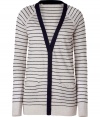 Stylish cardigan in fine wool-viscose blend - Fashionable in cream and black - Trendy, slim long cut, with a deep V-neck, long sleeves and accent piping - Two small pockets - A dream basic for everyday, very versatile to combine - Pairs with skinny jeans, leather pants, mini skirts