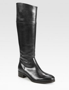 Asymmetrical equestrian-inspired tall silhouette, rendered in ultra-smooth leather with an easy back zip. Stacked heel, 1½ (40mm)Shaft, 17Leg circumference, 14Leather upperBack zipLeather liningRubber and leather solePadded insoleMade in Italy